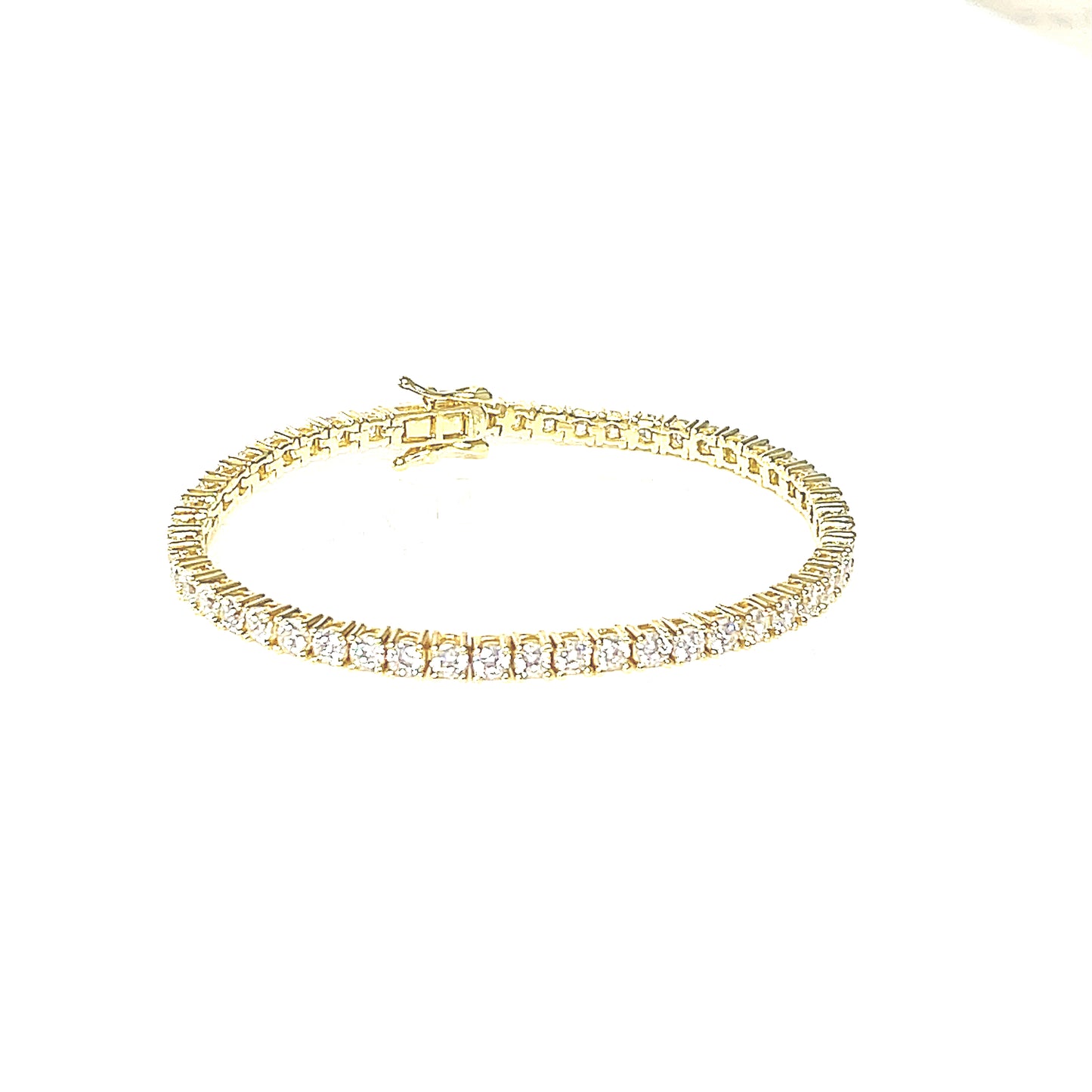 14K. Yellow gold-plated, rhodium plated sterling silver tennis bracelet. Enhancing your look with our luxurious tennis bracelet, exuding sophistication and elegance.